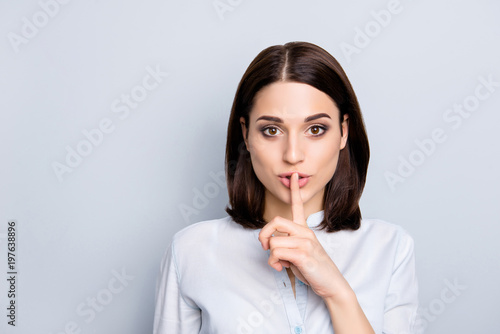 Shh shy sly people person modern concept. Close up portrait of cute lovely attractive uncertain unsure with stylish hairdo entrepreneur making hush gesture isolated on gray background copy-space