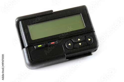 Black old pager isolated on white background , Vintage gadget for communication device