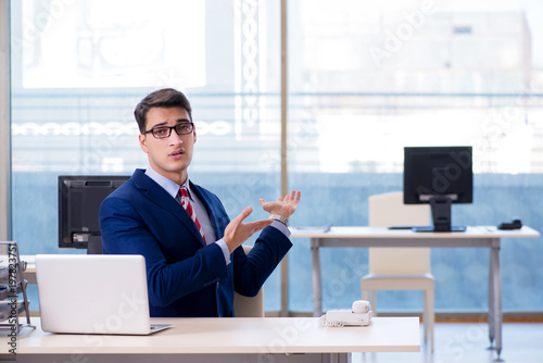 Businessman employee unhappy about absent employee