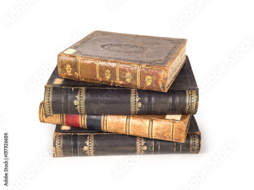 stack of old vintage books isolated