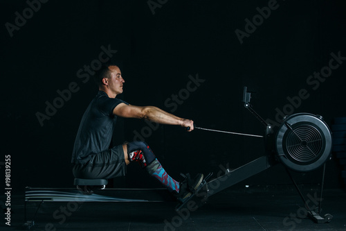 Man doing rowing exercise