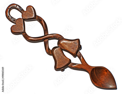 A traditional wooden Love Spoon as produced over the years in Wales.