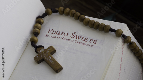 my hope - wooden rosary on the polish Holy Bible