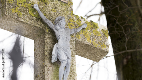 Roadside cross shrine in Poland in the winter