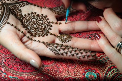 North America, USA, Washington. Indian Mehendi celebration. Henna application and rituals. Hand.