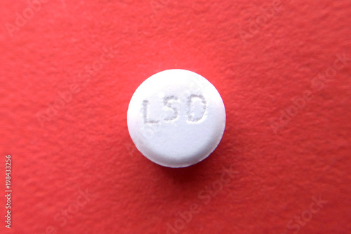 Tablet LSD on red