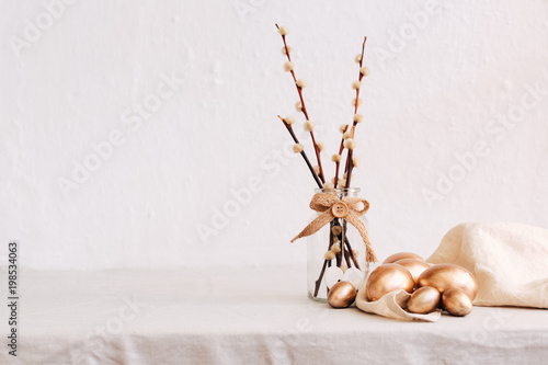 Easter still life decorations on linen table with copy space
