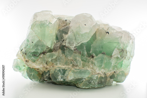 Green gemstone natural mineral fluoride or green beryl isolated