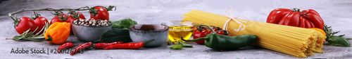 Italian food background with different types of pasta, health or vegetarian concept.