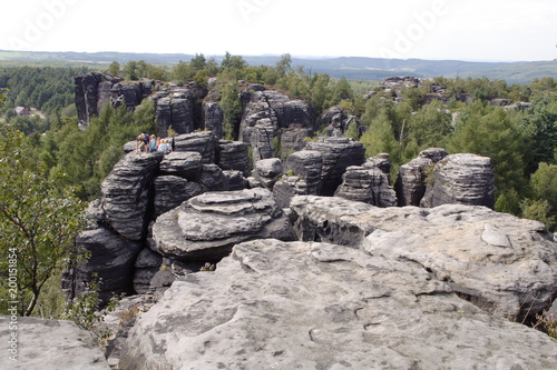 Climbing of rocky mountain top.