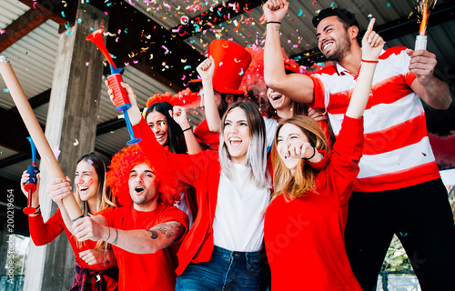 Football fans supporting their team at the arena for the world championship,