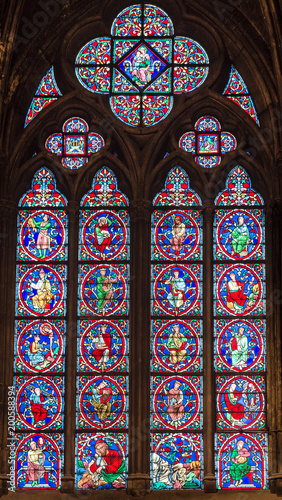 Wonderful stained glass window with sacred images.