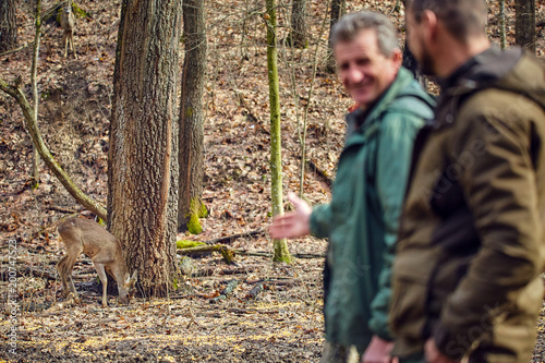 Game rangers at the feeding spot