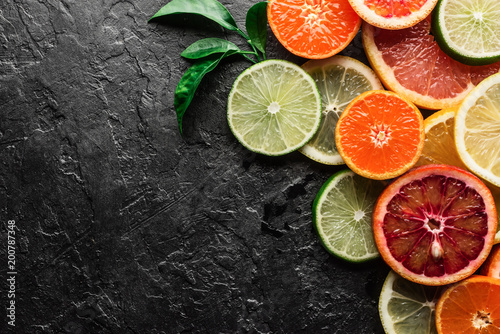 Mix of different citrus fruits closeup. Healthy diet vitamin concept. Food photography