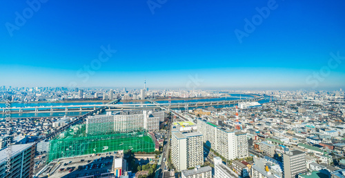 Asia business concept for real estate and corporate construction - panoramic urban city skyline aerial view under blue sky and sunny day in funabori, tokyo, Japan