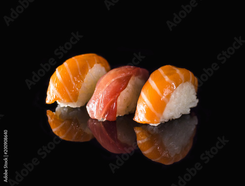 Sushi Salmon and Tuna taste on Black Background