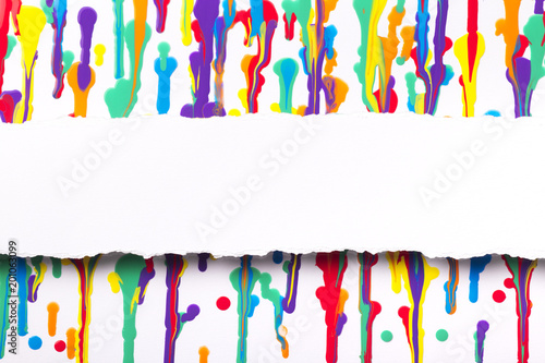 painted abstract background, strip of white paper with torn edges with a place