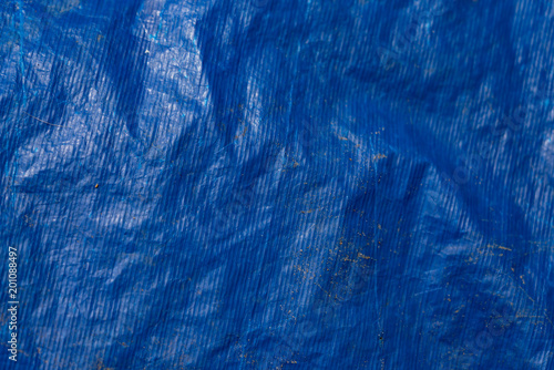 Background texture of blue plastic tarp