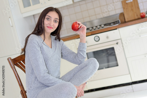 Young woman in the kitchen.