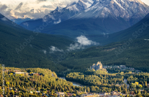 Sunset over city of Banff with Fairmont Springs Hotel Resort 