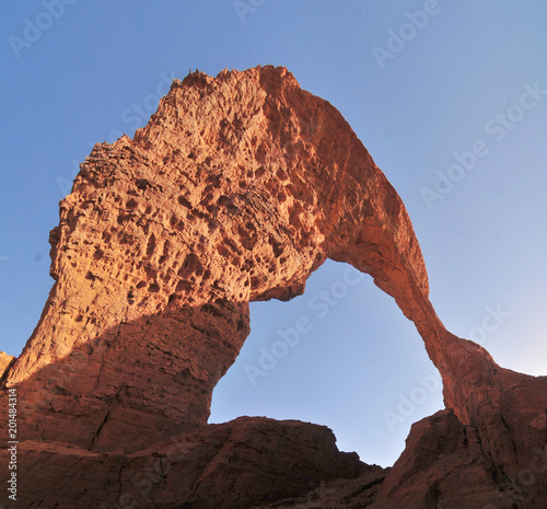 Arch of Bachikele in the shape of lyre, desert of Ennedi, Chad 