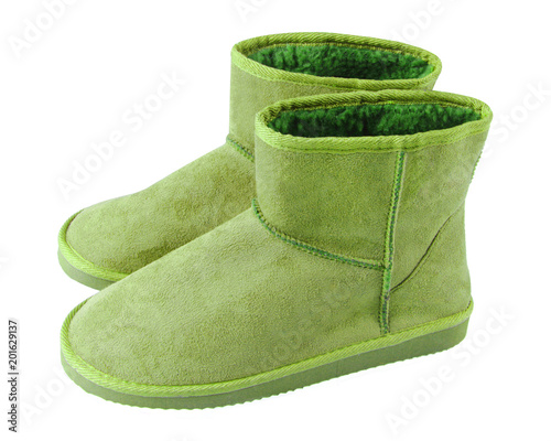 Chartreuse light green pair of short winter ugg boots isolated white
