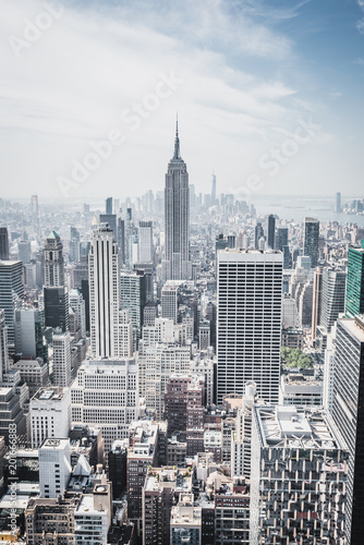 View from rockefeller center plattform over big apple new york city at a light cloudy day with blue sky, New York City, New York/ USA - August-21-2017