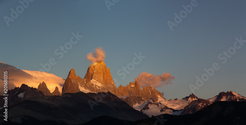 Colourful morning sunrise touch the top of Mount Fitz Roy, a mountain in Patagonia, on the border between Argentina and Chile. Located in the Southern Patagonian Ice Field near Chaltén.