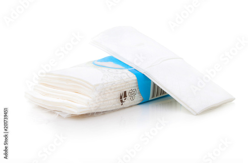 Packet of tissues isolated on the white background. Hygienic tissues for disposable usage. Napkins easily recyclable in plastic packet with bar code. Ten tissues in the packet on white background.