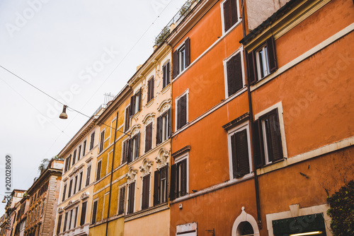 bottom view of colored buildings in Rome, Italy