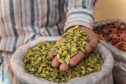 cardamom in the man's hand