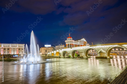 Illuminatednight view of the stone bridge and archaeological museum in macedonian capital skopje