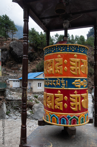 prayer wheel on trail to everest base nepal