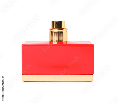 Red bottle of perfume on white background