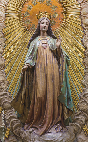 ZARAGOZA, SPAIN - MARCH 3, 2018: The carved statue of Virgin Mary in church Iglesia de San Miguel de los Navarros from 19. cent.