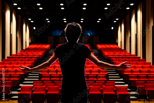 Young actor in a theater.