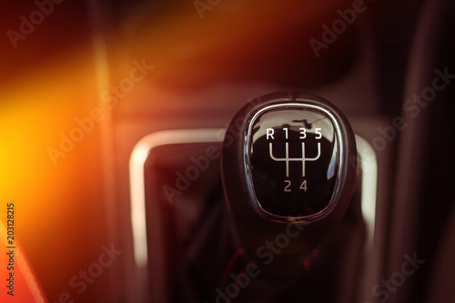 Manual gearbox with light, close-up on a dark background