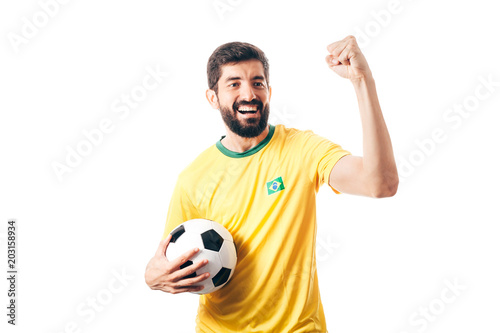 Brazilian soccer player celebrates on white background