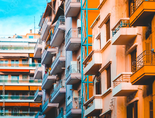 orange and blue colored apartment houses at greece