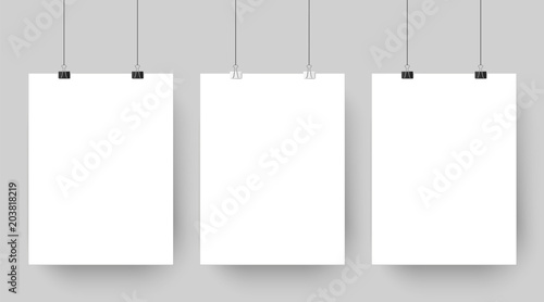 Empty affiche mockup hanging on paper clips. White blank advertising poster template casts shadow on gray background vector illustration