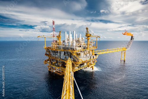 Offshore oil and gas platform with beautiful sky in the gulf of Thailand.