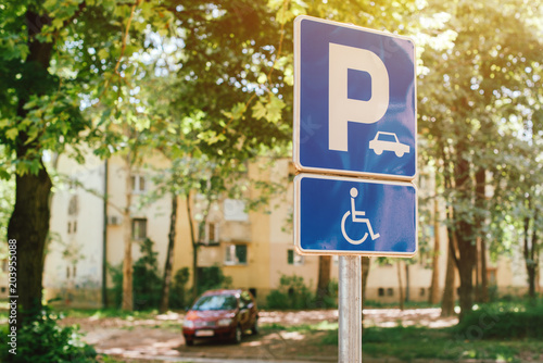 Handicap parking spot sign, reserved lot space for disabled pers