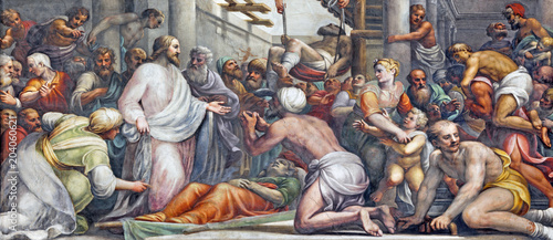 PARMA WŁOCHY, KWIECIEŃ, - 16, 2018: Fresk Jezus przy uzdrowieniem w Duomo Lattanzio Gambara (1567-1573).