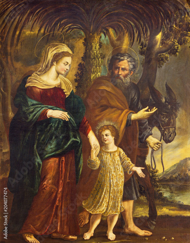 REGGIO EMILIA, ITALY - APRIL 13, 2018: The painting of Flight of Holy Family to Egypt in church Chiesa di Santo Stefano by unknown regional painter from 17. cent..