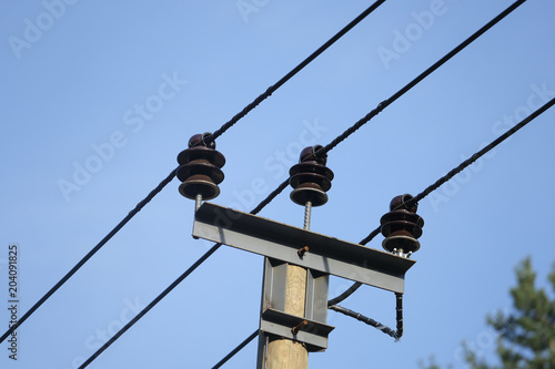Image of power transmission line pole close up