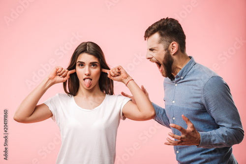Portrait of an angry young couple having an argument