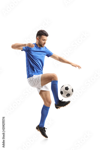 Soccer player juggling