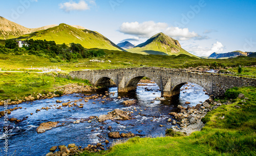 Old vintage brick bridge crossing river in Sligachan - Isle of Skye