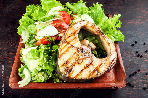 Grilled Fish Fillet with Vegetables in the plate