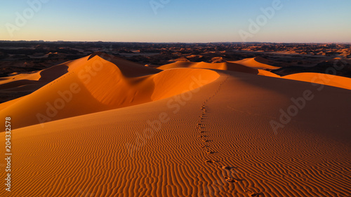 Sunset view to Tin Merzouga dune at Tassili nAjjer national park in Algeria